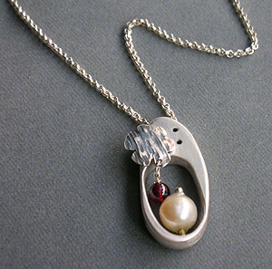 Hammered heart pendant